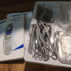 Samsung Silver Flip Phone with Accessories